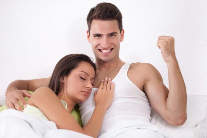 woman in bed with a man with more power